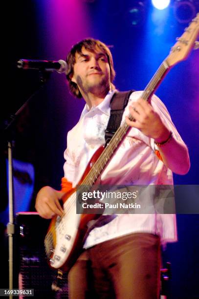 Brazilian bassist Andre Lopes, from the Latin pop group Bacilos, performs on stage, Chicago, Illinois, May 20, 2003.