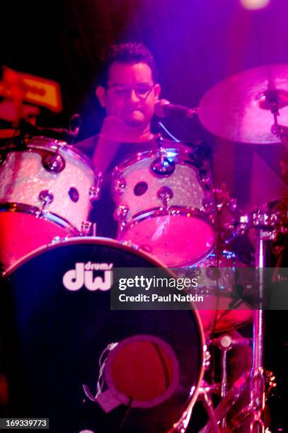 Puerto Rican percussionist Jose Javier Freire, from the Latin pop group Bacilos, performs on stage, Chicago, Illinois, May 20, 2003.