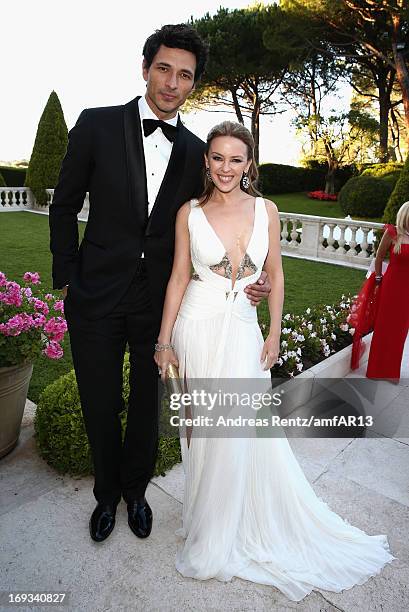 Andres Velencoso and Kylie Minogue attend amfAR's 20th Annual Cinema Against AIDS during The 66th Annual Cannes Film Festival at Hotel du...