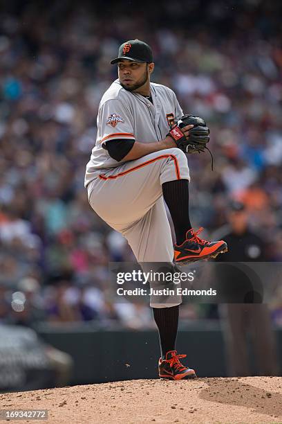 Jose Mijares of the San Francisco Giants pitches against the Colorado Rockies at Coors Field on May 19, 2013 in Denver, Colorado. The Rockies...