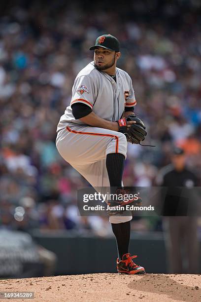 Jose Mijares of the San Francisco Giants pitches against the Colorado Rockies at Coors Field on May 19, 2013 in Denver, Colorado. The Rockies...
