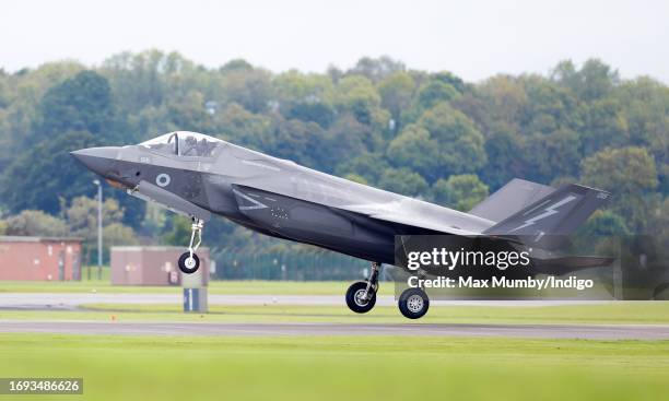 Lockheed Martin F-35 Lightning II seen landing at Royal Naval Air Station Yeovilton during a visit by Catherine, Princess of Wales on September 18,...