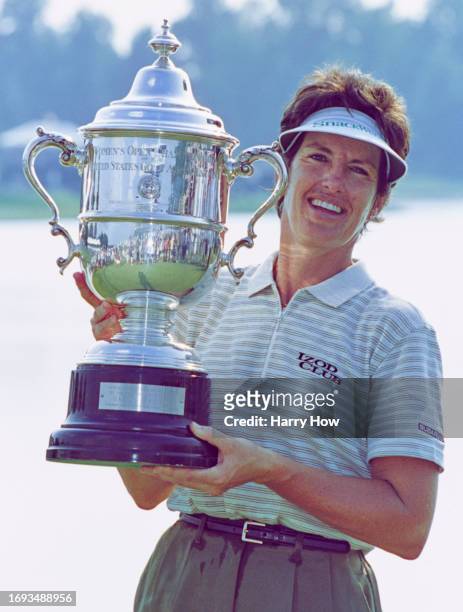Juli Inkster of the United States holds the Harton S Semple championship trophy after winning the 54th United States Women's Open golf tournament on...