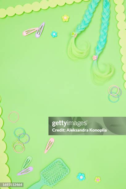 green mint kawaii background with braids, hair accessories, combs, hair clips and cute kawaii flowers. flat lay, top view, copy space - mint green stock pictures, royalty-free photos & images