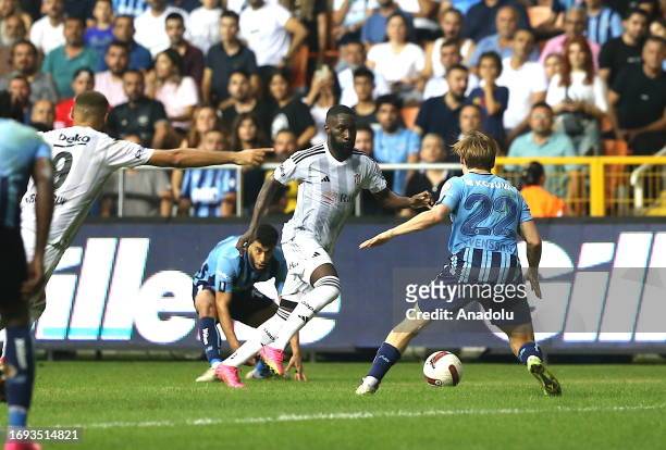 Svensson of Yukatel Adana Demirspor in action against Masuaku of Besiktas during Turkish Super Lig soccer match between Yukatel Adana Demirspor and...