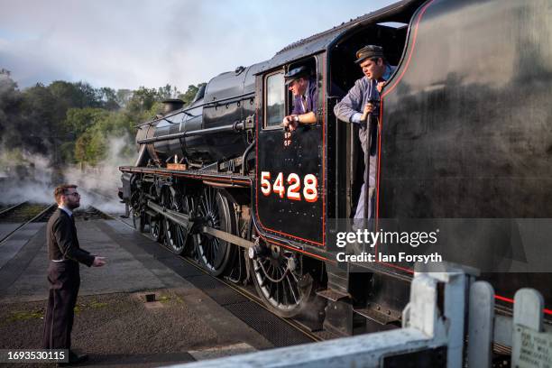 The steam locomotive Black 5 Eric Treacy No. 5428 leaves Grosmont Station during the 50th anniversary North Yorkshire Moors Railway steam gala on...