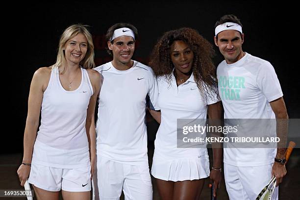 Tennismen and tennis women, Spanish Rafael Nadal , Swiss Roger Federer , Russian Maria Sharapova and US Serena Williams pose before performing for...