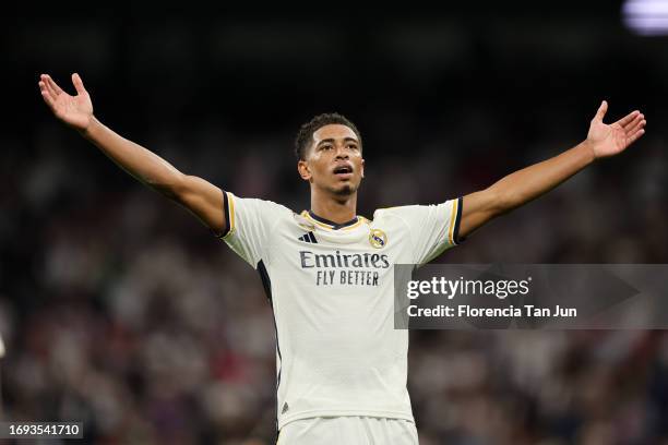 Jude Bellingham of Real Madrid celebrates after scoring their sides first goal during the UEFA Champions League match between Real Madrid CF and FC...