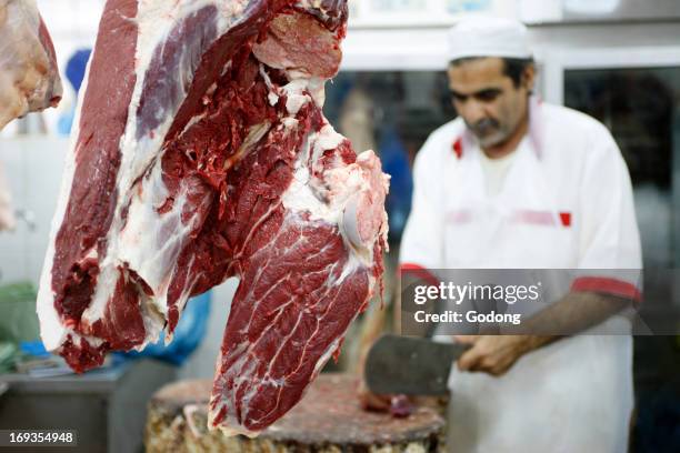 Butcher. Camel meat, United Arab Emirates.