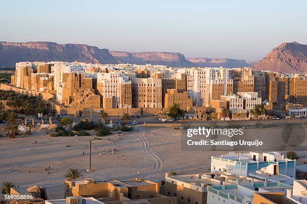 the famous mudbrick-made tower houses of shibam - shibam stock pictures, royalty-free photos & images