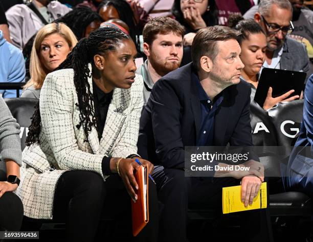 New York Liberty Assistant Coaches Roneeka Hodges and Olaf Lange sit on the bench during round two game two of the 2023 WNBA playoffs against the...