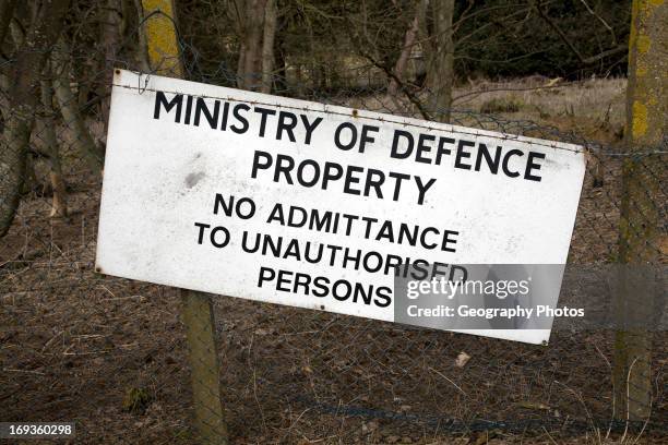 Ministry of Defence property sign No admittance to unauthorized persons on fence