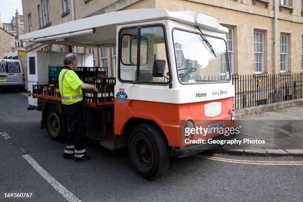 Milkman and traditional milk float