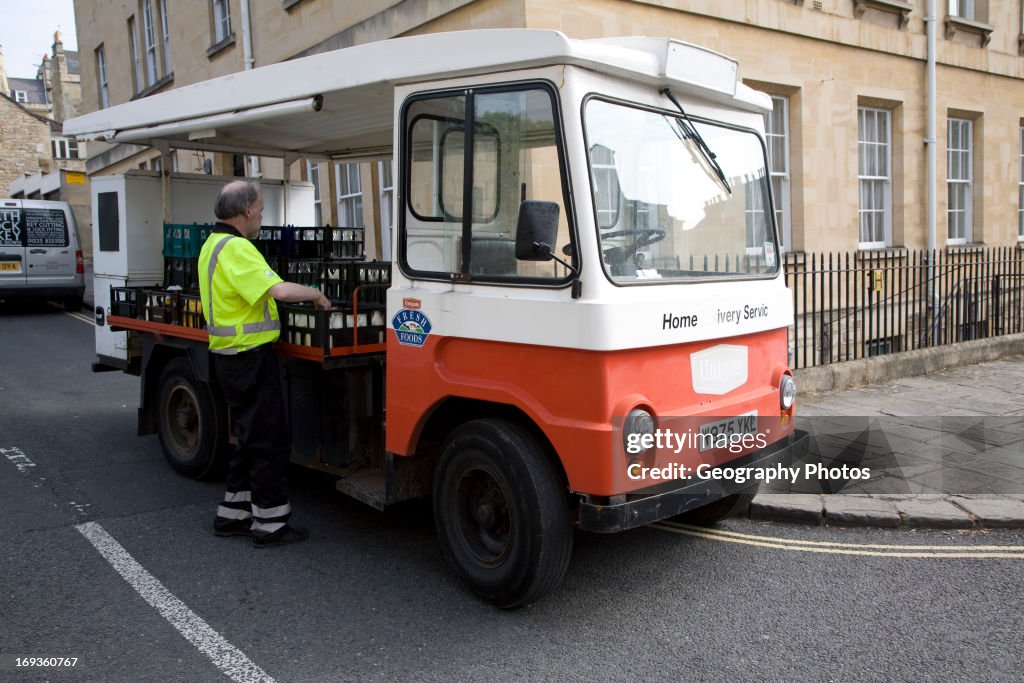Milkman and traditional milk float