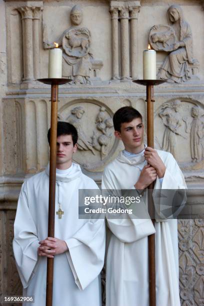 Altar boys outside Notre Dame de Paris cathedral