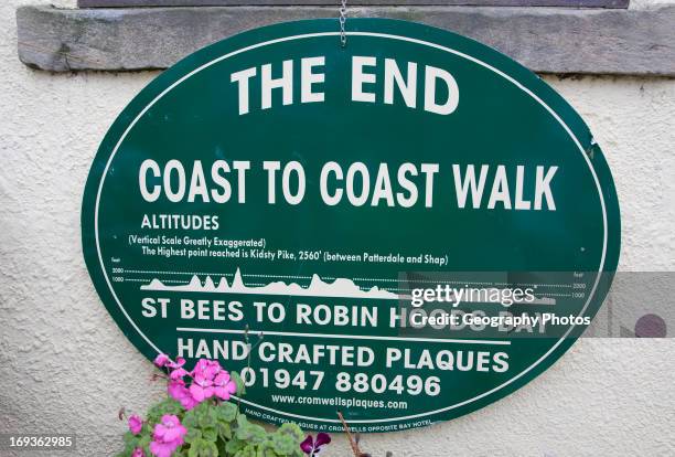 Sign showing the end of the Coast to Coast walk from St Bees to Robin Hoods Bay, England