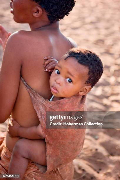 Bushmen mother with child