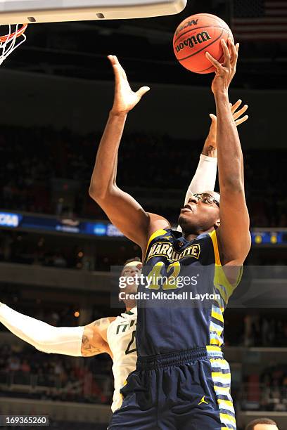 Chris Otule of the Marquette Golden Eagles drives to the basket during the East Regional Round of the 2013 NCAA Men's Basketball Tournament game...