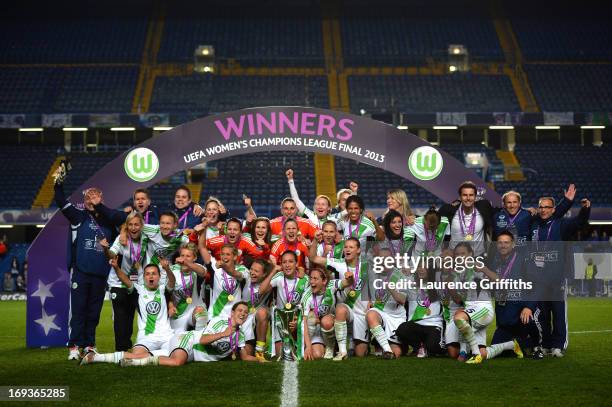 Nadine Kessler of VfL Wolfsburg and her team mates pose with the trophy after victory in the UEFA Women's Champions League Final Match between VfL...