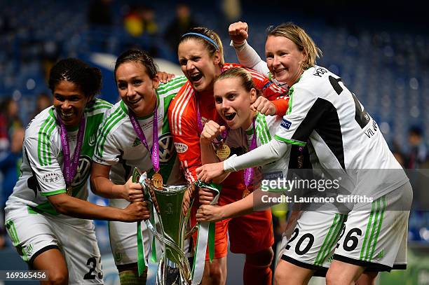 Navina Omilade, Nadine Kessler, Alisa Vetterlein, Stephanie Bunte and Conny Pohlers of VfL Wolfsburg celebrate with the trophy during the UEFA...