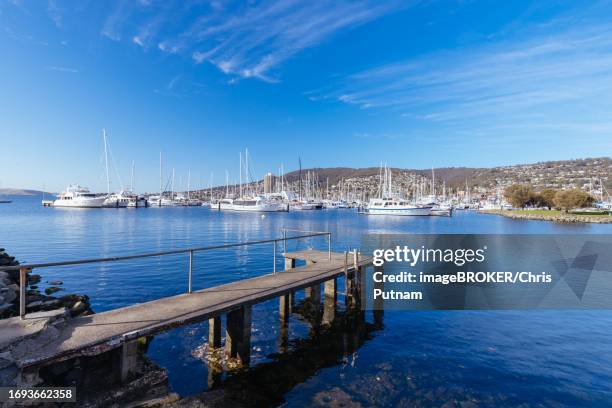 hobart, australia, september 15, 2022 a view towards sandy bay from errol flynn reserve on a spring morning in battery point, hobart, tasmania - hobart battery point stock pictures, royalty-free photos & images