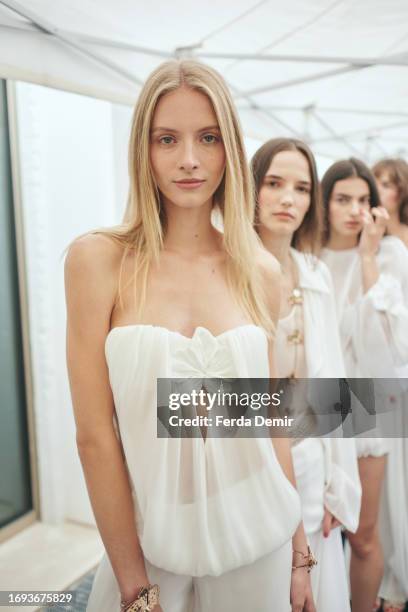 Models are seen backstage ahead of the Genny fashion show during the Milan Fashion Week Womenswear Spring/Summer 2024 on September 21, 2023 in Milan,...