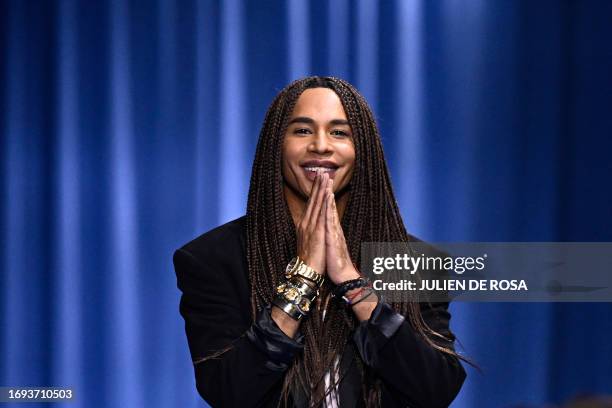 French fashion designer Olivier Rousteing acknowledges the audience at the end of the Balmain show as part of the Paris Fashion Week Womenswear...