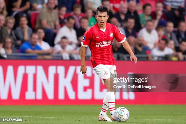 Hirving Lozano of PSV Eindhoven controls the ball during the Dutch Eredivisie match between PSV Eindhoven and Go Ahead Eagles at Philips Stadion on...