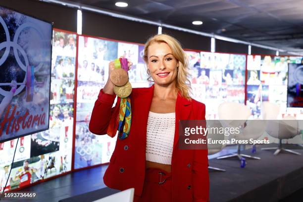 Lydia Valentin poses for a photo during an event in which Lydia Valentin, Olympic Weightlifting Champion, announces her withdrawal from the...