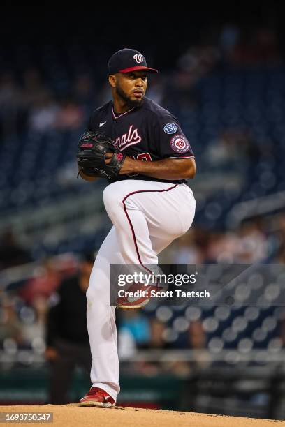 Joan Adon of the Washington Nationals pitches against the Chicago White Sox during the first inning at Nationals Park on September 18, 2023 in...