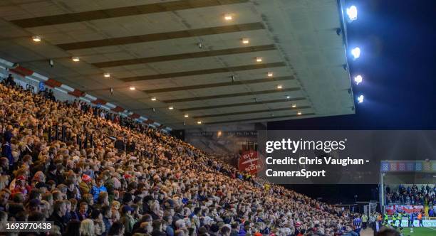 Lincoln City fans watch their team in action with Lincoln Cathedral in the background during the Carabao Cup Third Round match between Lincoln City...