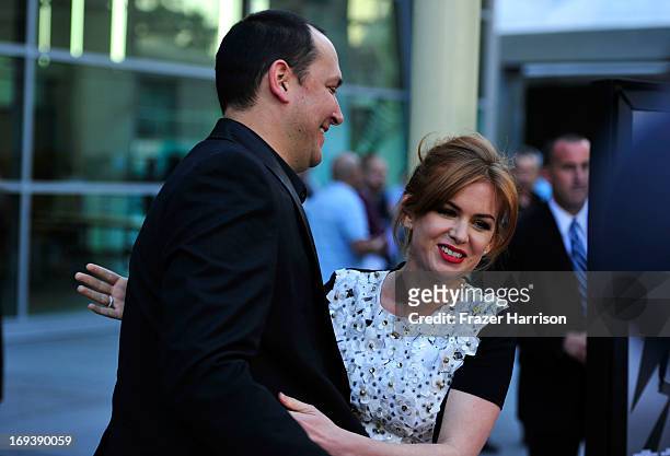 Director Louis Leterrier and actress Isla Fisher arrives at the Screening Of Summit Entertainment's "Now You See Me" at ArcLight Hollywood on May 23,...