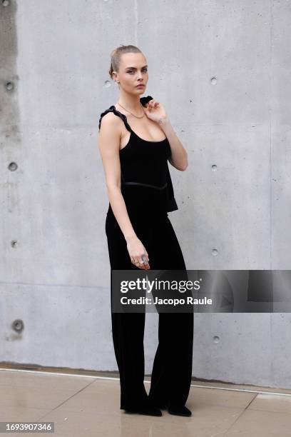 Cara Delevingne attends the Emporio Armani fashion show during the Milan Fashion Week Womenswear Spring/Summer 2024 on September 21, 2023 in Milan,...