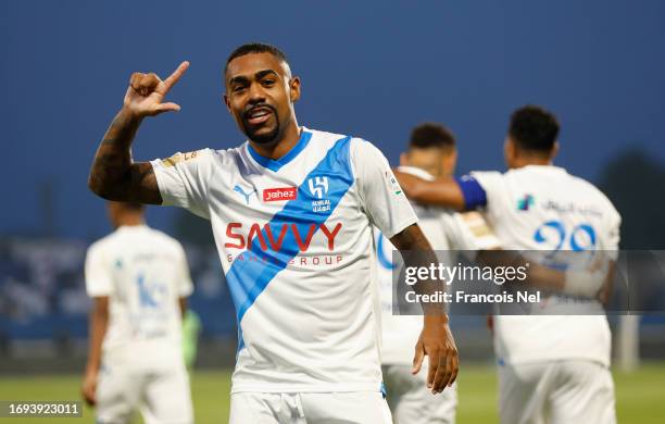 Malcom of Al Hilal Club celebrates after scoring his teams first goal during the Saudi Pro League match between Damak and and Al Hilal at Prince...