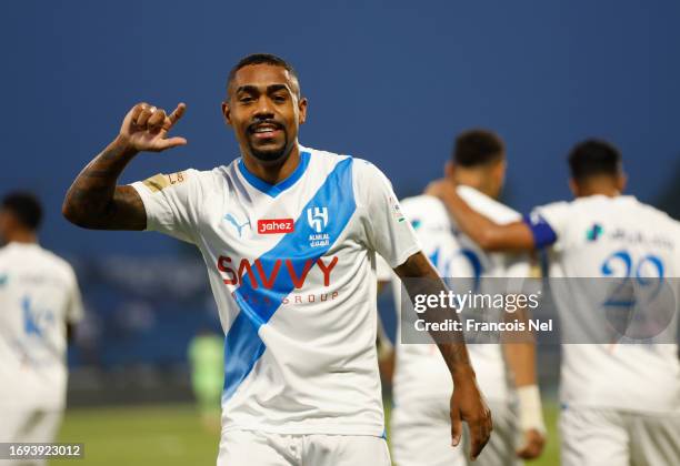 Malcom of Al Hilal Club celebrates after scoring his teams first goal during the Saudi Pro League match between Damak and and Al Hilal at Prince...