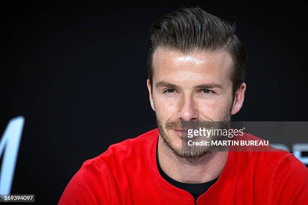 Paris Saint-Germain's football club English midfielder David Beckham waits for fans prior to sign autographs, at a Swedish multinational...