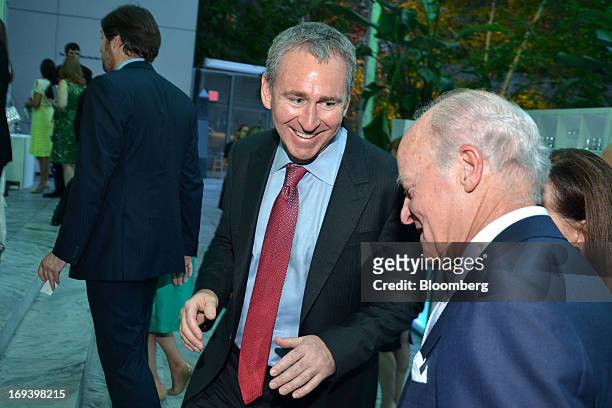 Ken Griffin, chief executive officer and founder of Citadel LLC, left, and Henry Kravis, co-chairman of KKR & Co., converse during the Museum of...