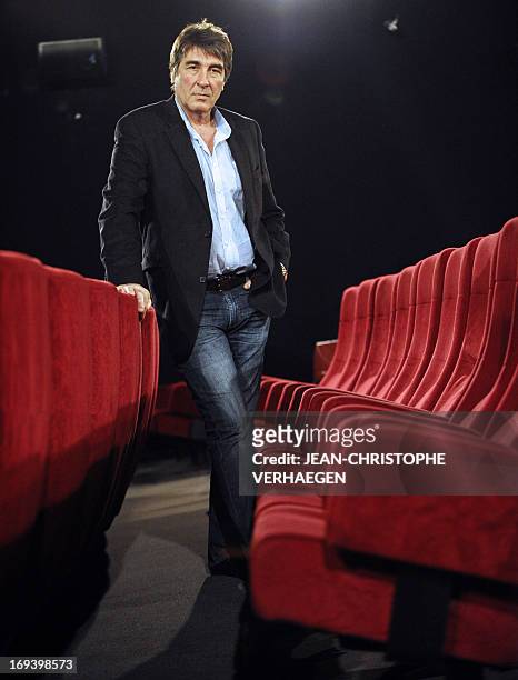 Eric Lengrand, a cinema operator in northeastern France, poses in one of his cinemas on May 7, 2013 in Verdun, northeastern France. AFP PHOTO /...