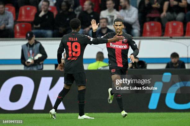 Amine Adli of Bayer Leverkusen celebrates with teammate Nathan Tella of Bayer Leverkusen after scoring the team's second goal during the UEFA Europa...