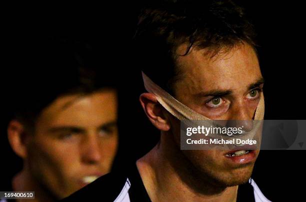 Nick Maxwell of the Magpies with his nose taped up during the round nine AFL match between the Collingwood Magpies and the Sydney Swans at Melbourne...