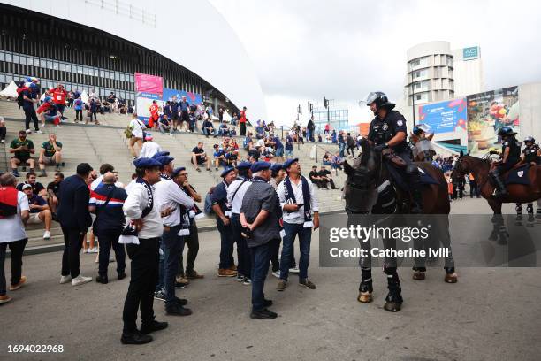 General view outside the stadium as fans of France interact with members of the Police Nationale prior to the Rugby World Cup France 2023 match...