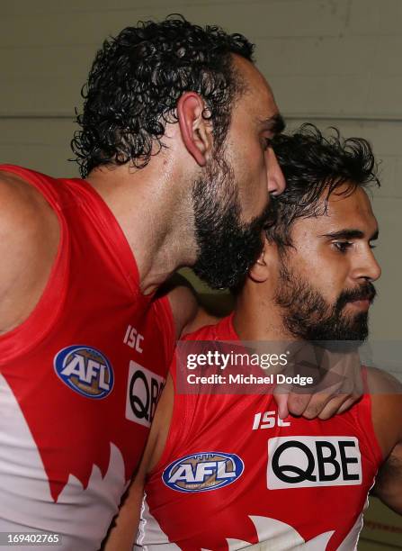 Adam Goodes kisses Lewis Jetta of the Swans after the win during an AFL match between the Collingwood Magpies and the Sydney Swans at Melbourne...