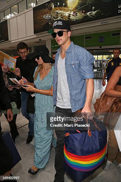 Paris Hilton and her boyfriend River Viperii are seen at Nice airport during the 66th Annual Cannes Film Festival on May 24, 2013 in Nice, France.