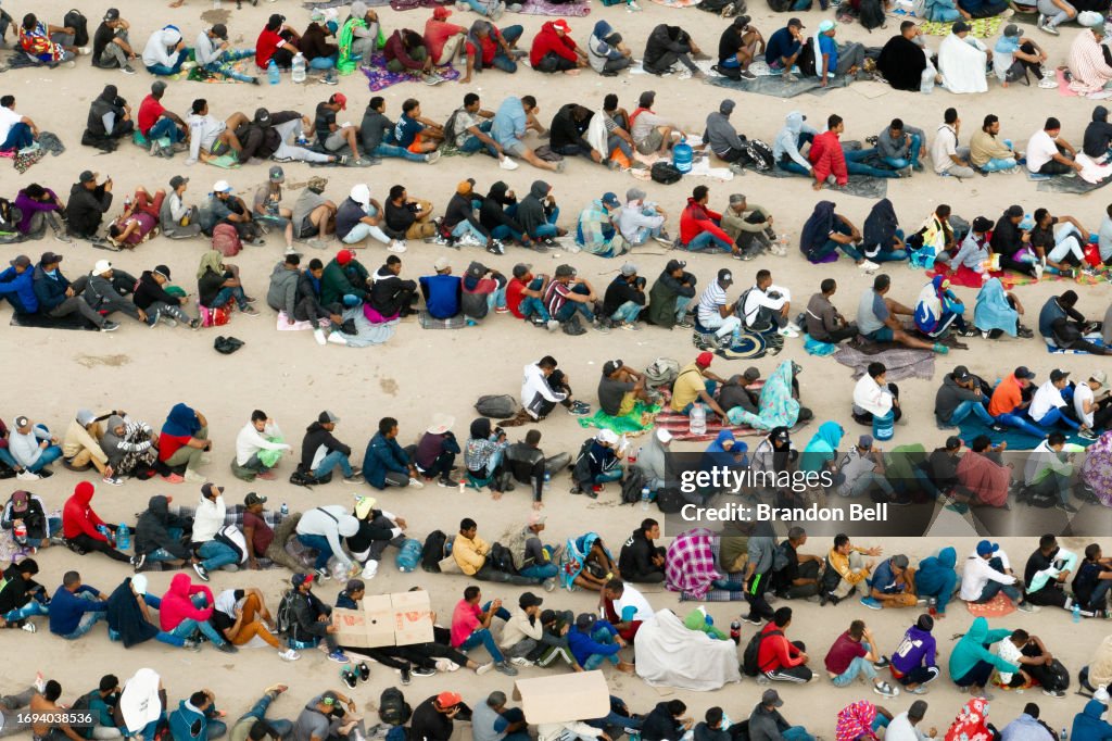 Migrants Wait On Mexican Side Of Border, Hoping For Entry Into United States