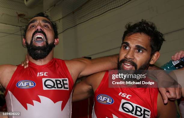 Adam Goodes and Lewis Jetta of the Swans celebrate the win during the round nine AFL match between the Collingwood Magpies and the Sydney Swans at...