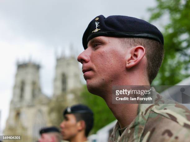 Troops stand to attention in front of York Minster as over 300 soldiers marched through the city streets on May 24, 2013 in York, England. The...