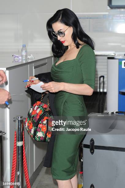 Dita Von Teese is seen arriving at Nice airport dueing The 66th Annual Cannes Film Festival on May 24, 2013 in Nice, France.