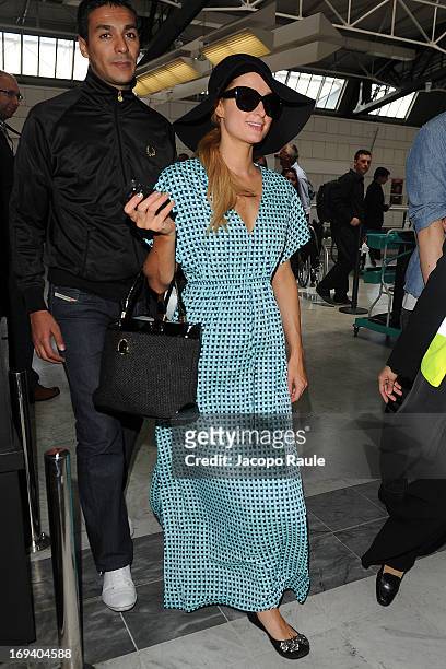 Paris Hilton is seen arriving at Nice airport during The 66th Annual Cannes Film Festival on May 24, 2013 in Nice, France.