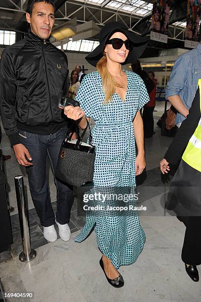 Paris Hilton is seen arriving at Nice airport during The 66th Annual Cannes Film Festival on May 24, 2013 in Nice, France.