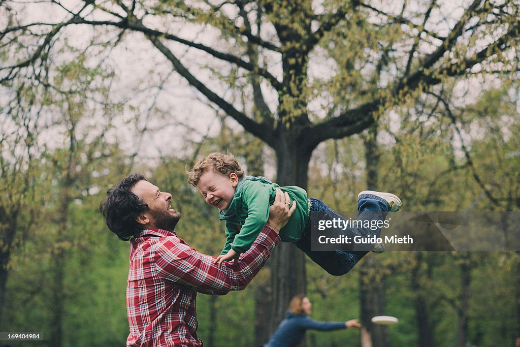 Father and son playing